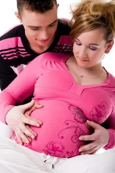 Pregnant couple with a babycap