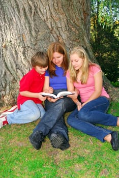 Family reading a book