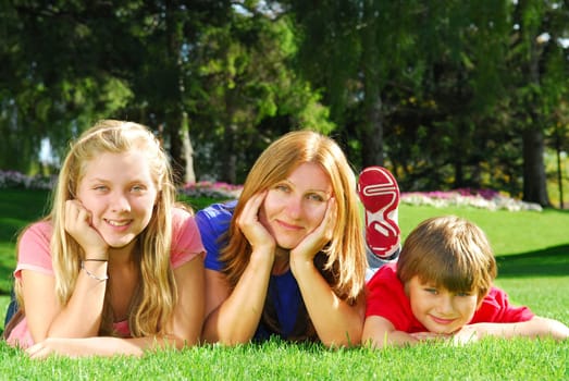 Family relaxing in a park