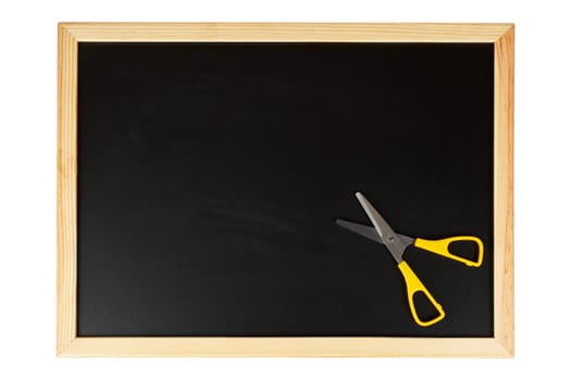 Chalkboard with yellow scissors