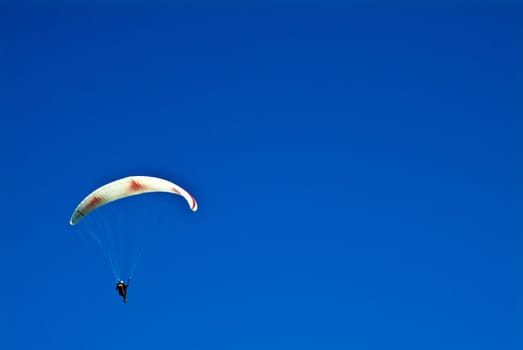 Hang gliders above the clouds