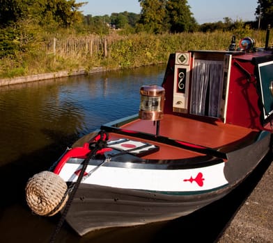 Ornate brass driving lamp on bow of canal barge