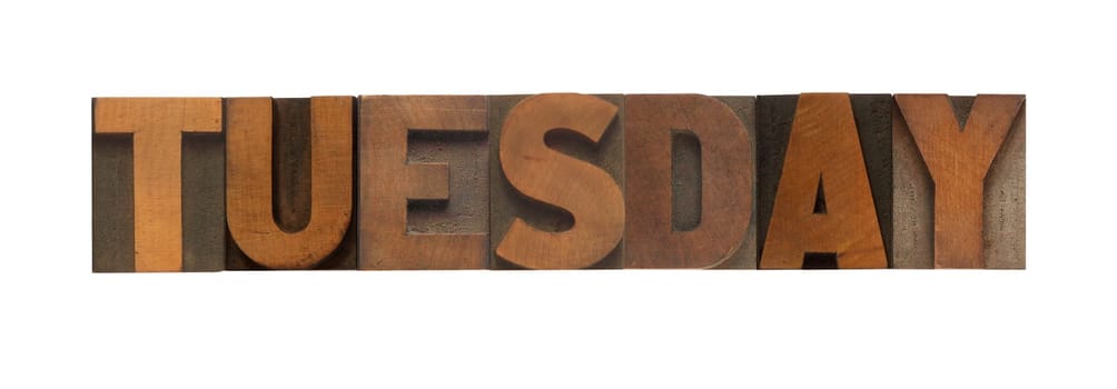 the word Tuesday in old wood type