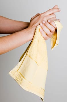 Drying hands with a towel