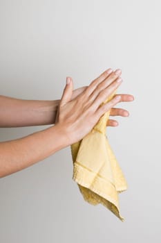 Drying hands with a towel