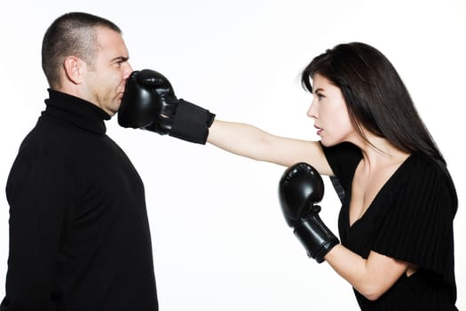 studio shot portrait on isolated white background of a Beautiful Funny couple expressive fighting