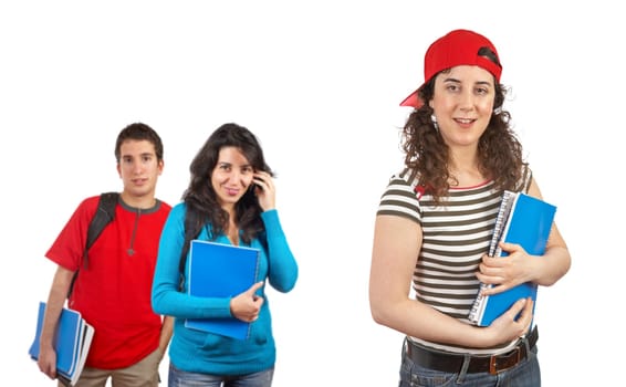 Three students with books and backpacks
