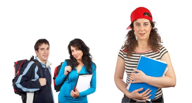 Three students with books and backpacks