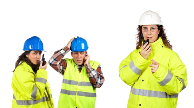 Construction workers talking with a walkie talkie