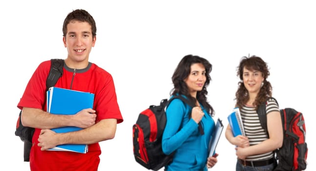 Three students with books and backpacks