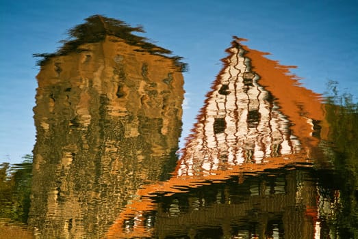 Reflection of a building in the water