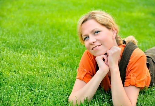Young woman relaxing on the grass