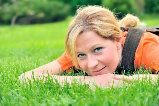 Young woman relaxing on the grass