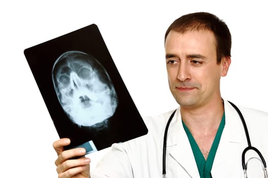 young caucasian doctor and x-ray of head isolated on white