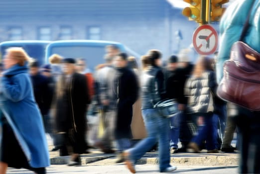 an image of people walking in rush hour