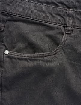 Black jeans front pocket with buttons, close up