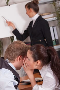 whispering and trouble in conference