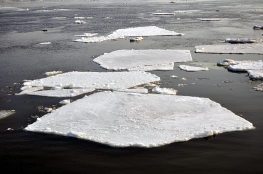 Winter scenery, ice blocks floating