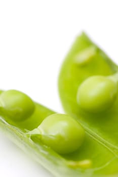 fresh peas on white background