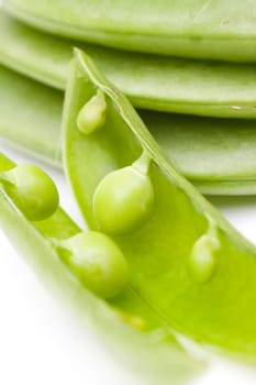 fresh peas on white background