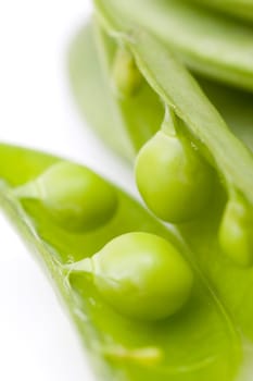 fresh peas on white background