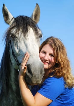 Young woman with horse