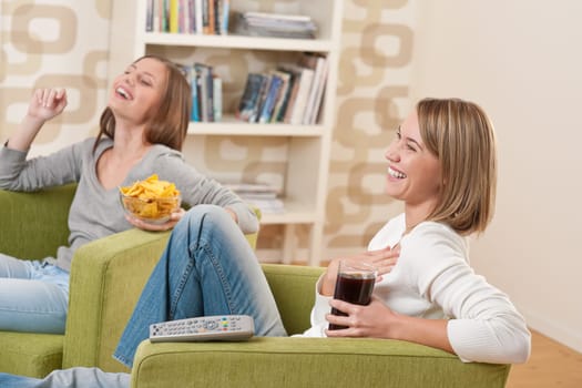 Two female students watching television
