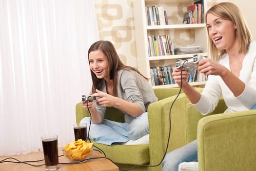 Two female students playing TV games