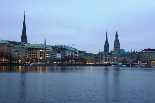Hamburg's Inner Alster shortly after sunrise on a gray autumn morning