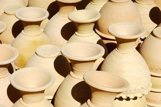 Unfired ceramic vases before firing
