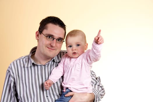 Father with daughter in his arms