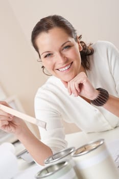 Young female interior designer at office