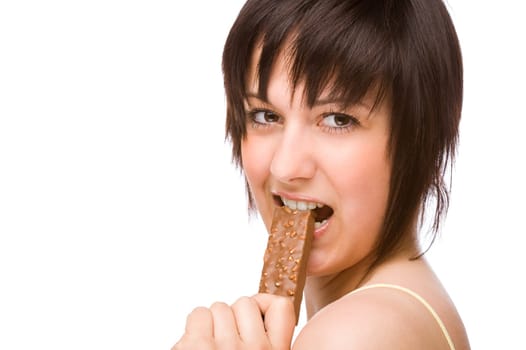 Young woman loading a chocolate bar