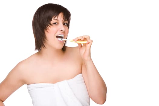 Young woman brushing her teeth