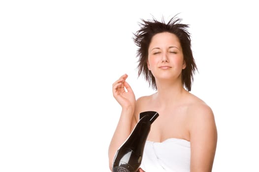 Young woman with a hair dryer