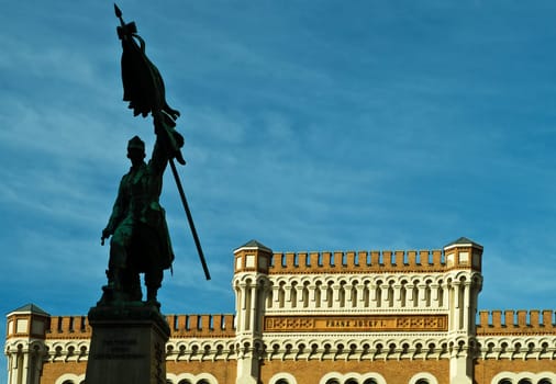 Heroes' monument in front of a barracks
