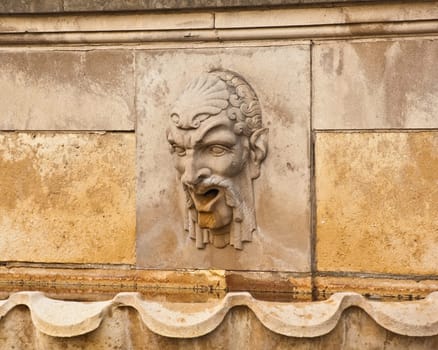 Statue of Face on Fountain