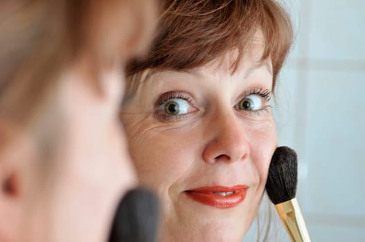woman with rouge brush