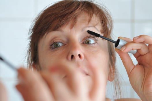 woman and mascara