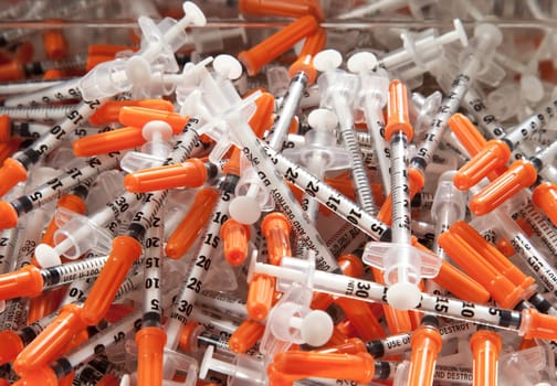 Pile of used syringes