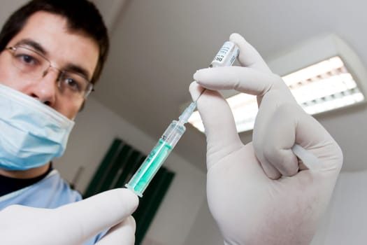 Doctor with syringe