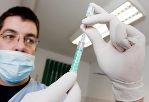 Doctor with syringe