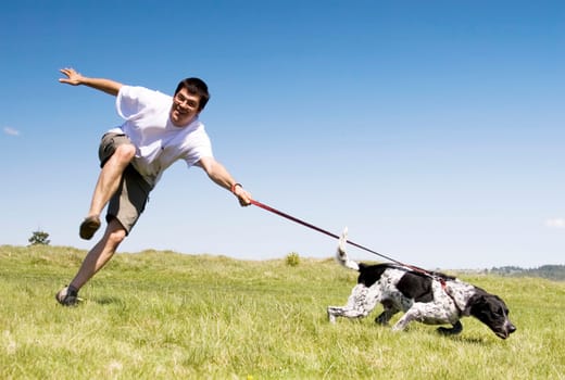 Man playing with his dog