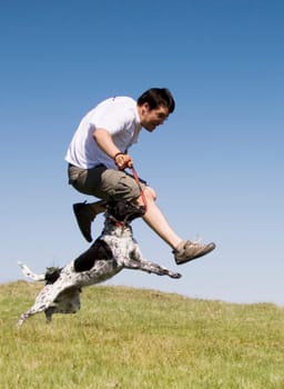 Man playing with his dog