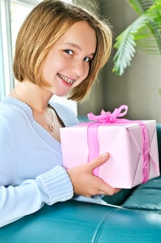 Teenage girl with present