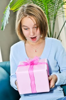 Teenage girl with present