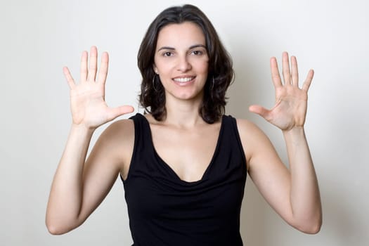 Woman displays the number ten