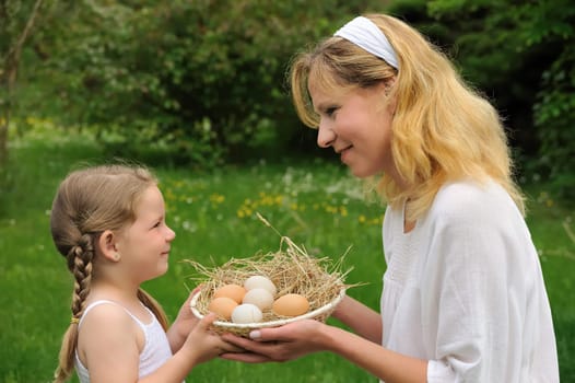 Mother and daughter having Easter time