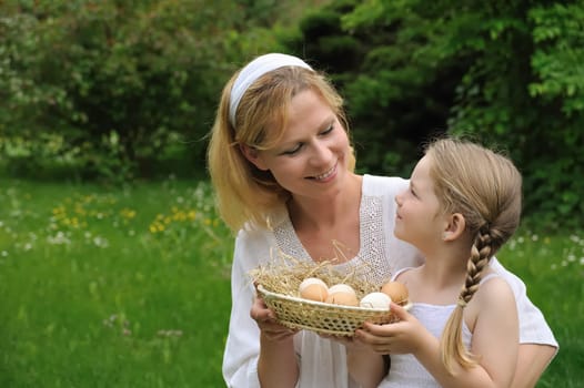 Mother and daughter having Easter time