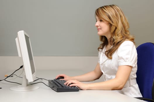 Young woman in office